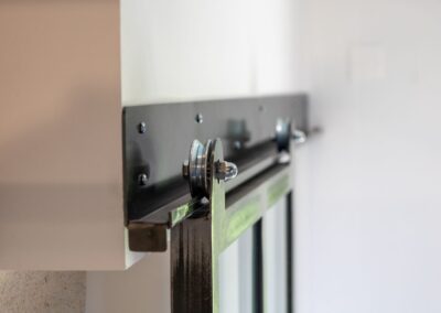 Porte verrière coulissante mécanisme